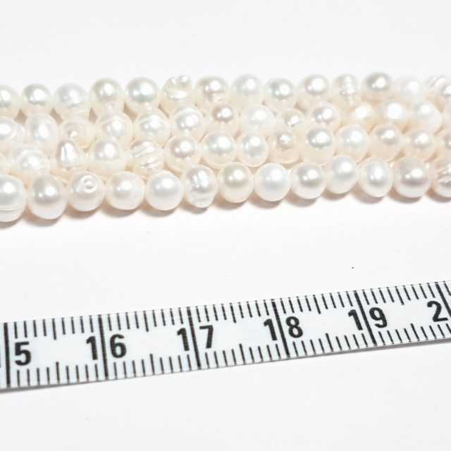 Жемчуг культивированный 4*5мм форма кукуруза, цв. белый нить около 35см