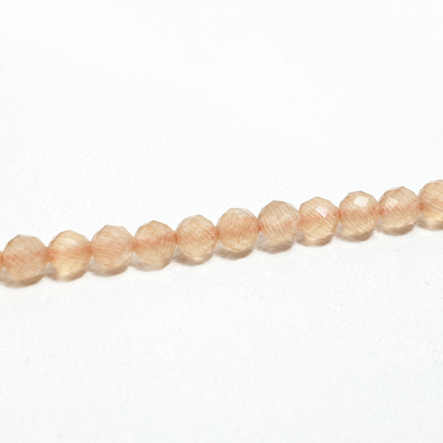 Бусины кошачий глаз персиковый гранёный 3мм, на нити  36см.
