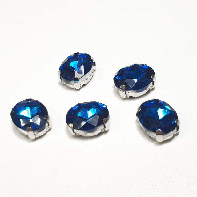 Страз стекло в цапе овал 8х10мм Blue Zircan 5шт